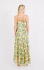 Girl wearing MIRTH women's long singapore spaghetti strap drop waist dress in camelia bloom green floral print cotton