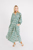 Girl wearing MIRTH women's long faro caftan dress in seaglass green