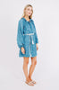 Girl wearing MIRTH women's somerset short coverup dress in indigo rain blue cotton 