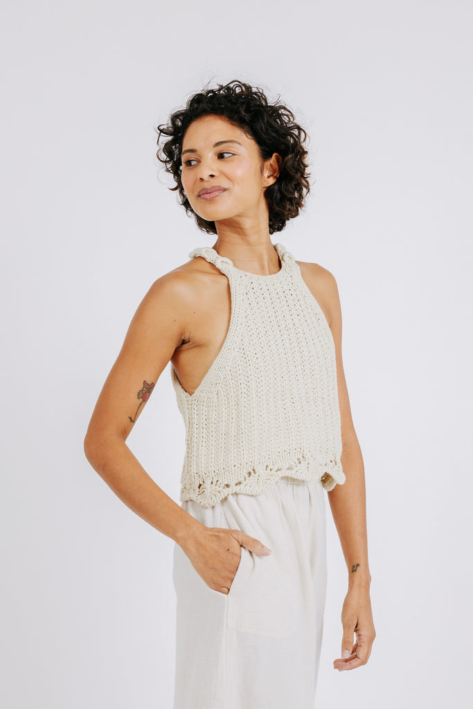 Girl wearing MIRTH women's knit sleevless borocay tank top coverup in bone cream