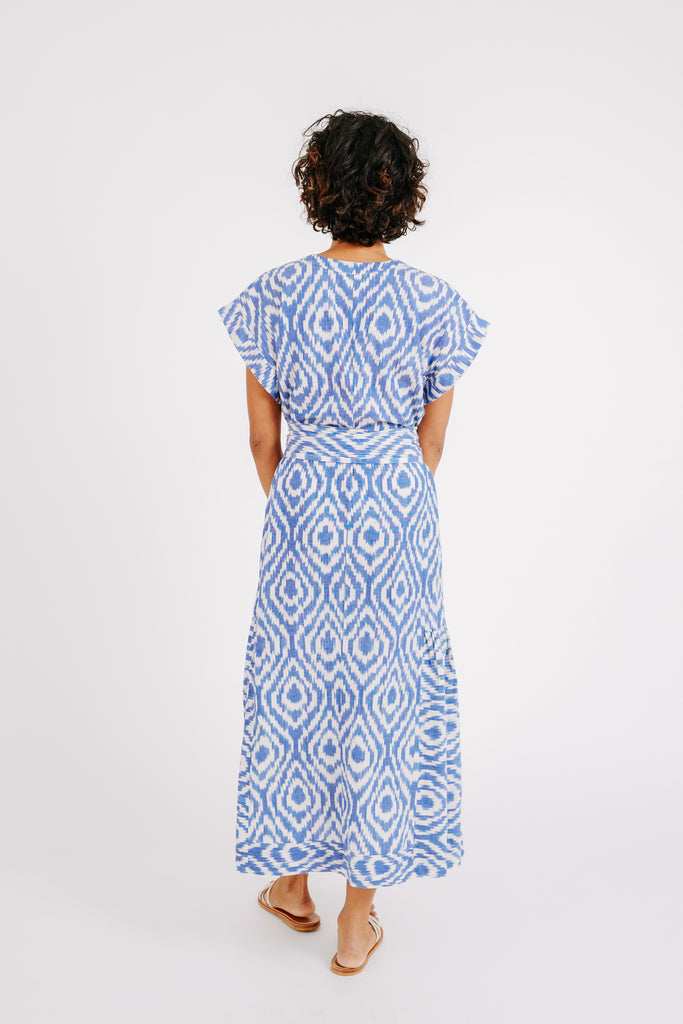Girl wearing MIRTH women's short sleeved oaxaca long dress in azure ikat blue cotton