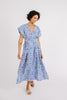 Girl wearing MIRTH women's short sleeved oaxaca long dress in azure ikat blue cotton