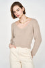 Girl wearing MIRTH women's knit v neck bellagio sweater in taupe brown wool