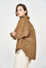 Girl wearing MIRTH women's quilted oversized kyoto jacket in brown tannin cotton