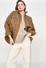 Girl wearing MIRTH women's quilted oversized kyoto jacket in brown tannin cotton