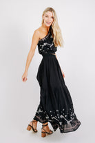 Girl wearing MIRTH women's long flowy paros skirt set in handloomed black carnival jamdani