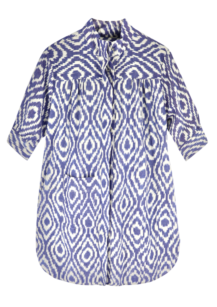 Girl wearing MIRTH women's short button marfa shirt camp dress in azure ikat blue cotton