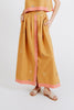Girl wearing MIRTH women's long lucerne skirt set in handloomed sedona orange jamdani
