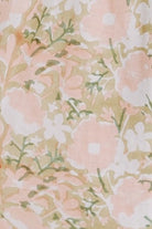 Girl wearing MIRTH women's long tiered short sleeve vienna maxi dress in snapdragon bloom pink floral print cotton