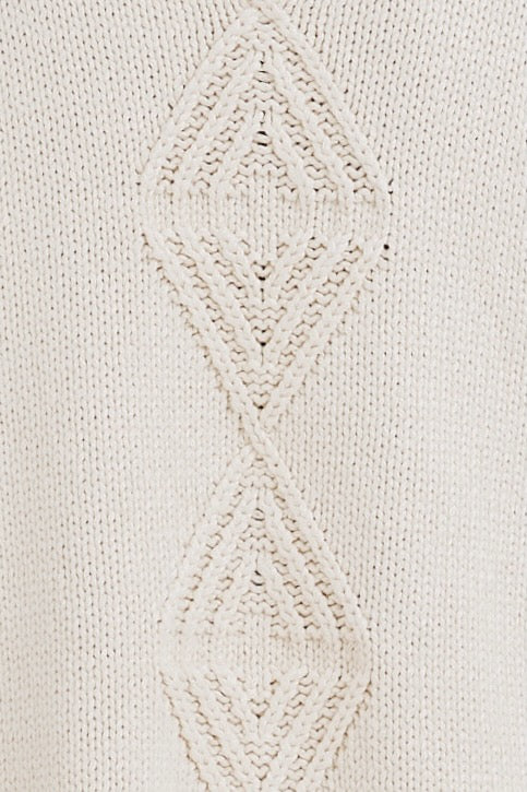 Girl wearing MIRTH women's knit short Osaka sweater dress in bone cream