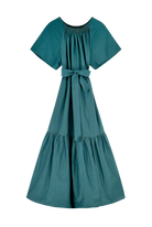 Girl wearing MIRTH women's long tiered gathered short sleeve vienna maxi dress in spruce green cotton silk with tie belt