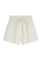 Girl wearing MIRTH women's elastic drawstring woodstock cotton wide leg shorts with pockets in bone cream