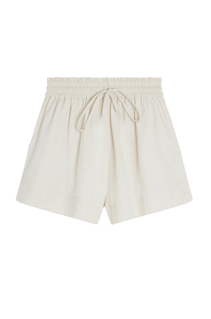 Girl wearing MIRTH women's elastic drawstring woodstock cotton wide leg shorts with pockets in bone cream