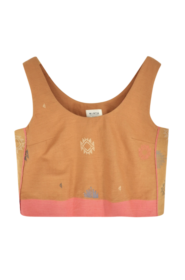 Girl wearing MIRTH women's sleeveless hudson tank top set in handloomed sedona orange jamdani cotton