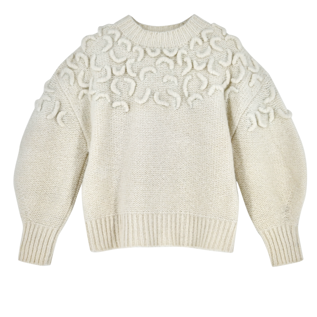 Girl wearing MIRTH women's knit cusco pullover sweater in ivory white wool