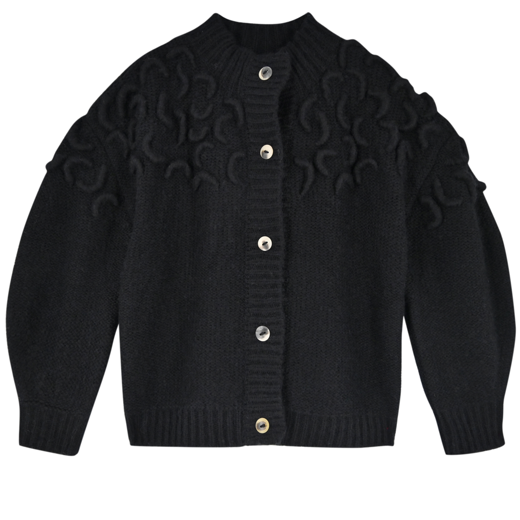 Girl wearing MIRTH women's knit cusco cardigan sweater in black wool