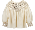 Girl wearing MIRTH women's pullover rosette rosenberg blouse in cream cotton silk