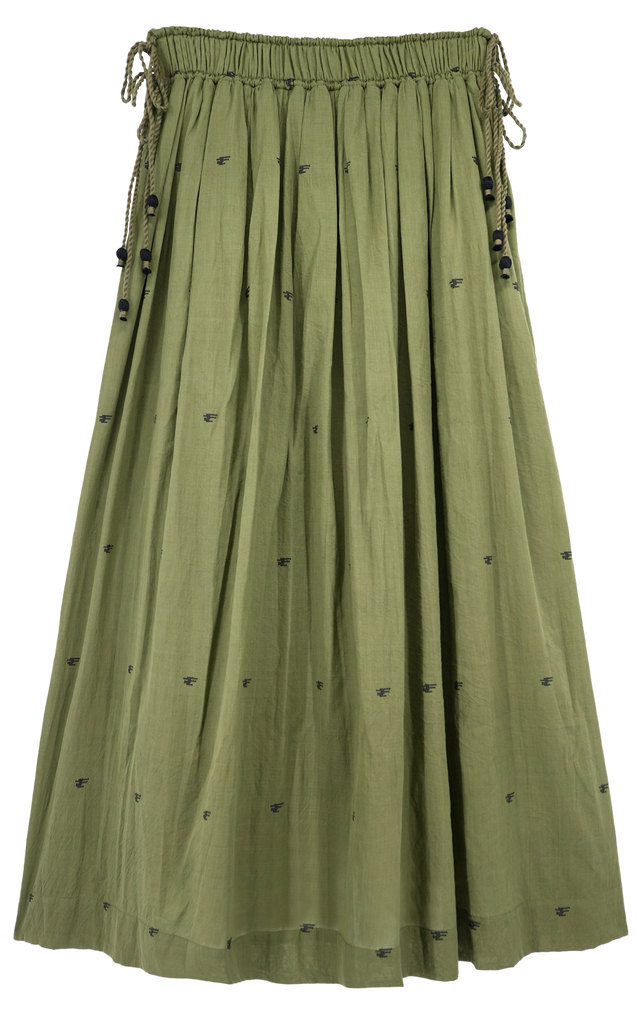 Girl wearing MIRTH women's lowy maxi verona vacation skirt in handloomed jamdani olive green cotton